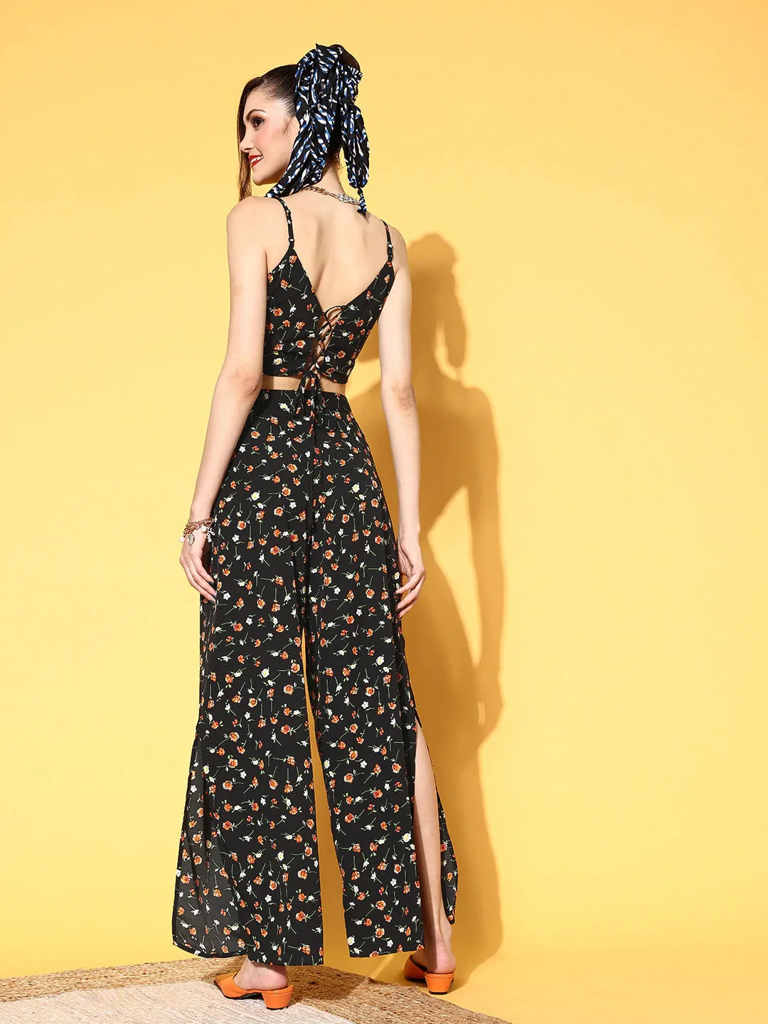 Berrylush Women Black & Orange Floral Printed V-Neck Crop Top & Side-Slit Trousers Co-Ord Set