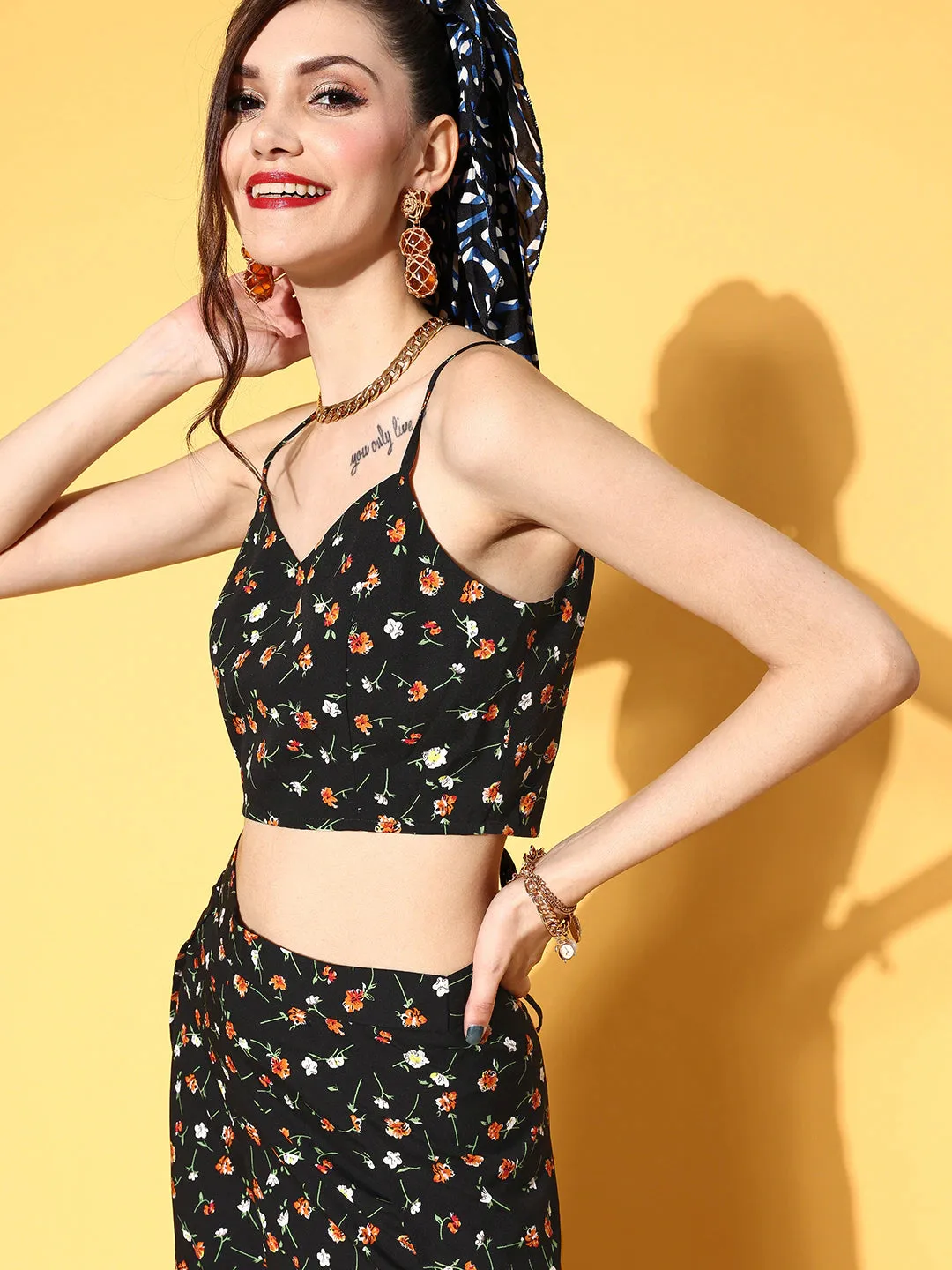 Berrylush Women Black & Orange Floral Printed V-Neck Crop Top & Side-Slit Trousers Co-Ord Set